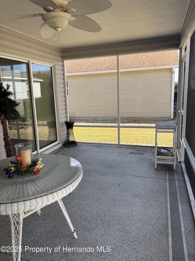 unfurnished sunroom with plenty of natural light