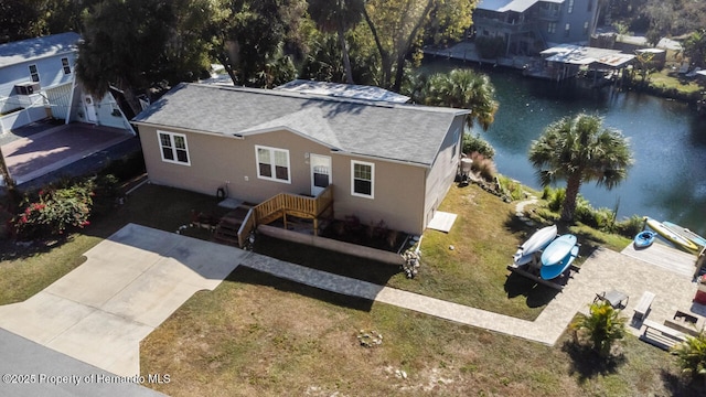 bird's eye view with a water view