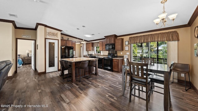 dining room with crown molding, an inviting chandelier, and dark hardwood / wood-style flooring