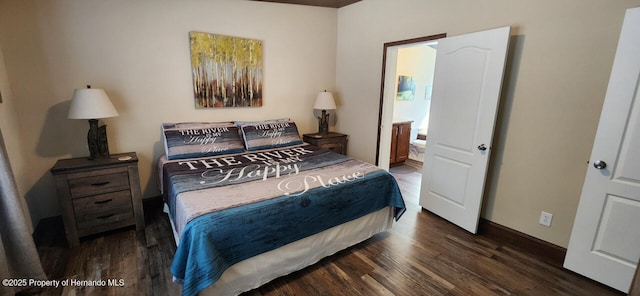 bedroom featuring dark hardwood / wood-style floors