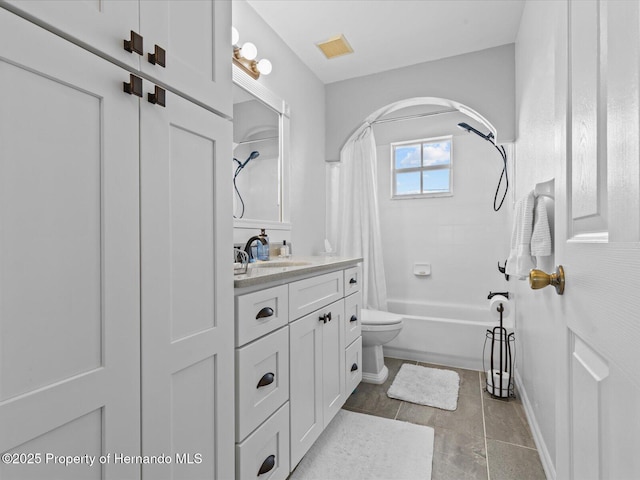 full bathroom with vanity, toilet, tile patterned flooring, and shower / bath combo with shower curtain