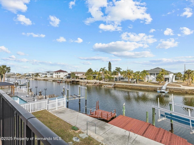 dock area with a water view