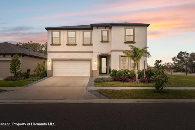 view of front of property featuring a garage