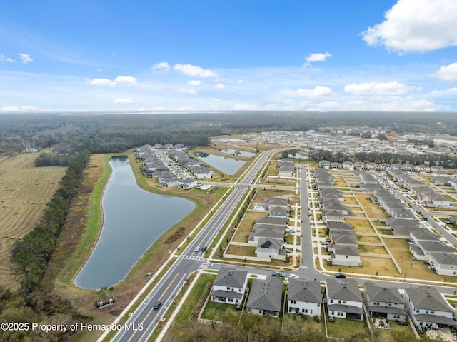 drone / aerial view with a water view