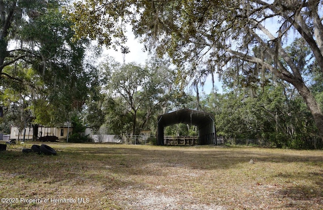 view of yard featuring a carport