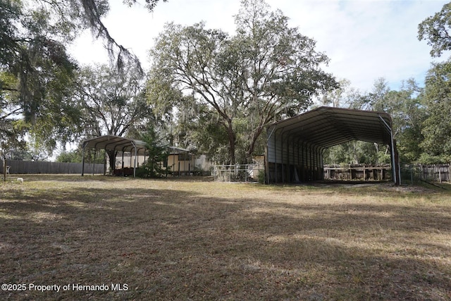 view of yard featuring a carport