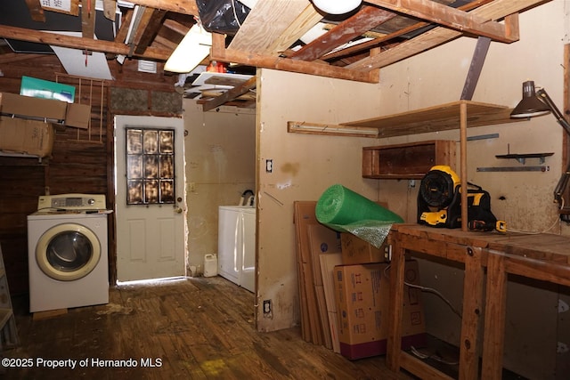 washroom with washer / clothes dryer and dark hardwood / wood-style floors