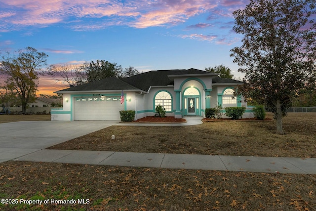 view of front of property featuring a garage