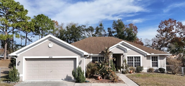 single story home featuring a garage