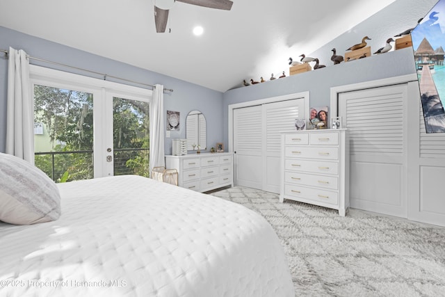 bedroom featuring access to outside, multiple closets, vaulted ceiling, ceiling fan, and light carpet