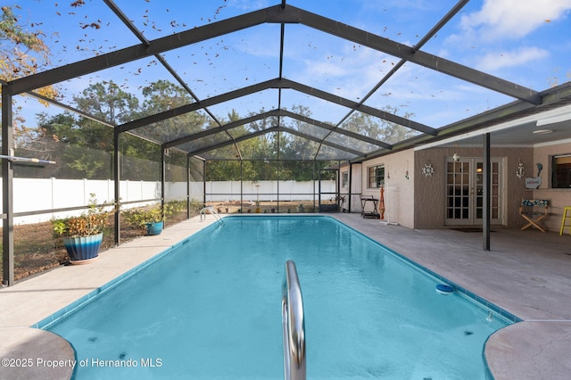 view of pool featuring a lanai and a patio