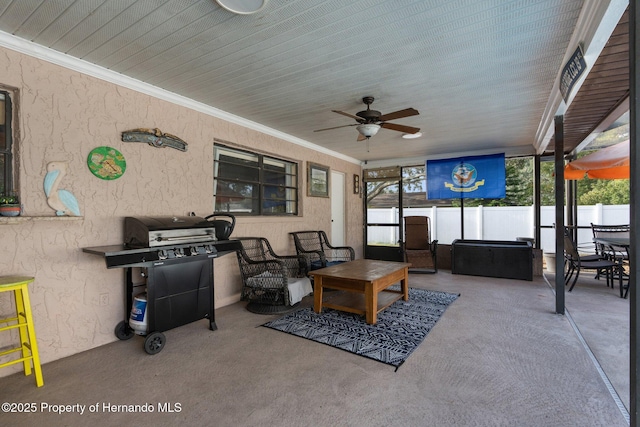 exterior space with grilling area, outdoor lounge area, and ceiling fan