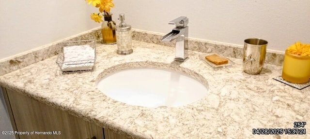interior details featuring a sink