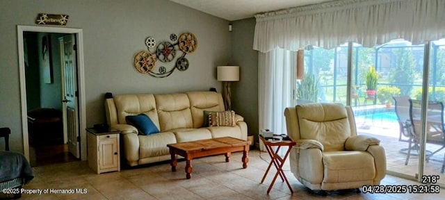 living area with light tile patterned flooring