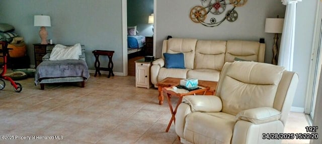 living area with light tile patterned flooring