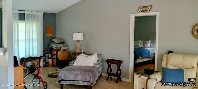 sitting room with tile patterned flooring