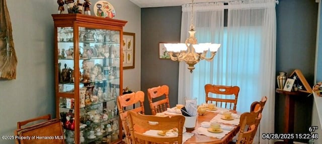 dining room with a chandelier