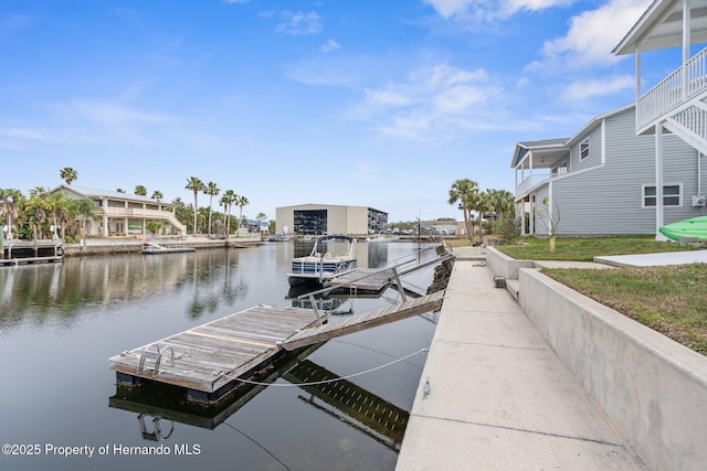 dock area featuring a water view