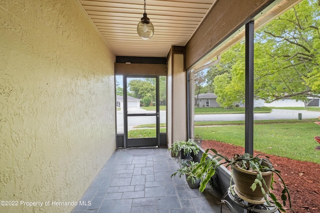 view of unfurnished sunroom