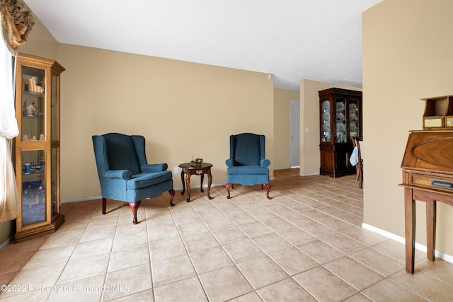 living area featuring light tile patterned floors