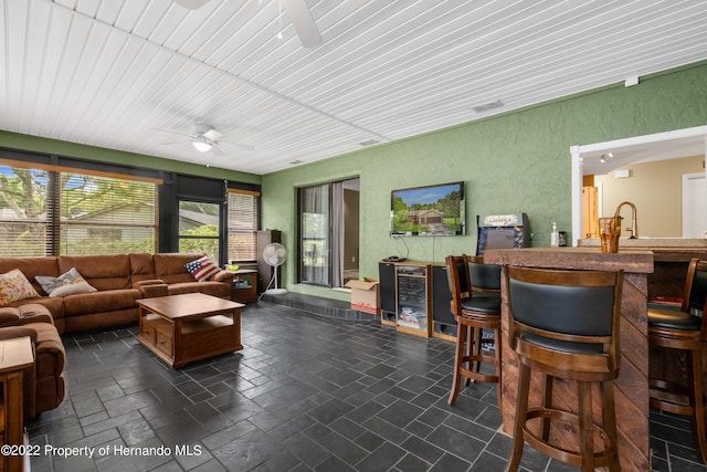 living room with ceiling fan