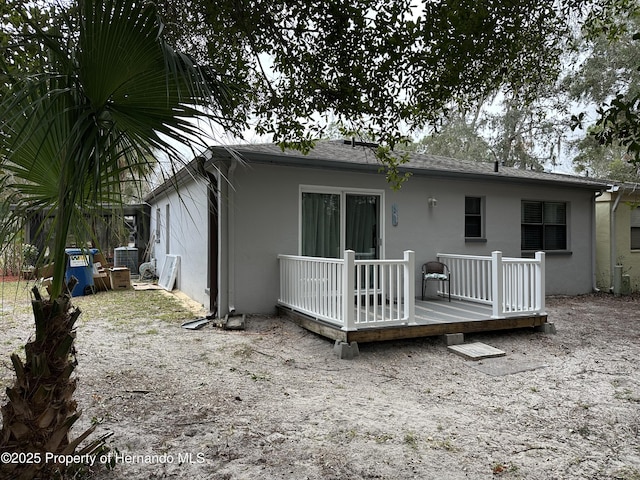 rear view of house with a deck