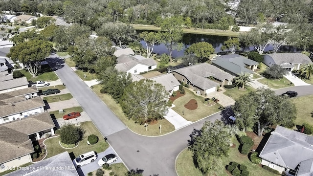 drone / aerial view featuring a water view