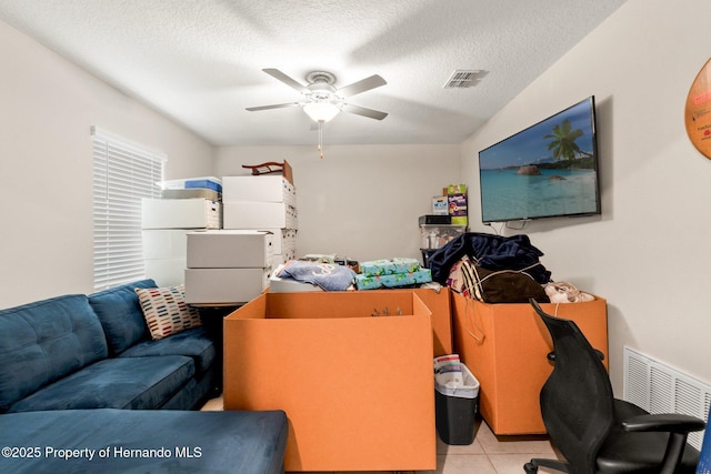 storage area featuring ceiling fan