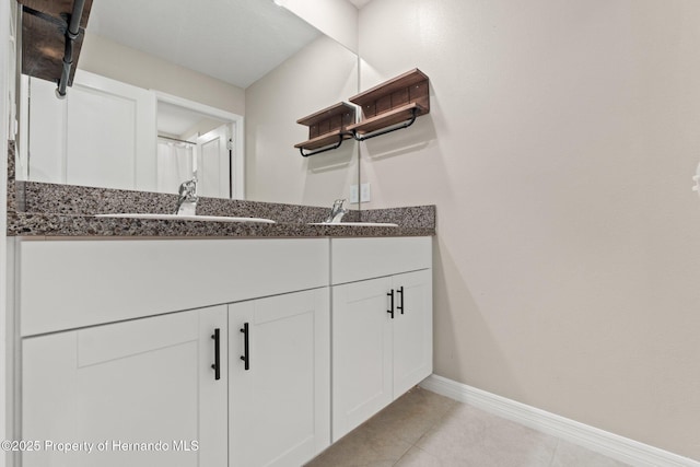 bathroom featuring vanity and tile patterned floors