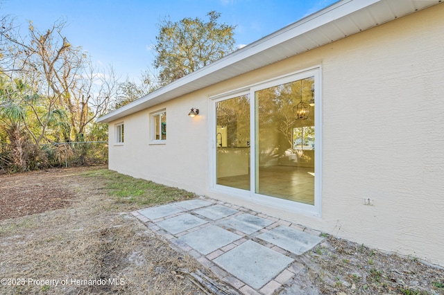 view of home's exterior featuring a patio area