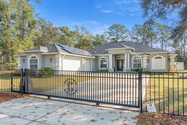 single story home with a garage and a front yard