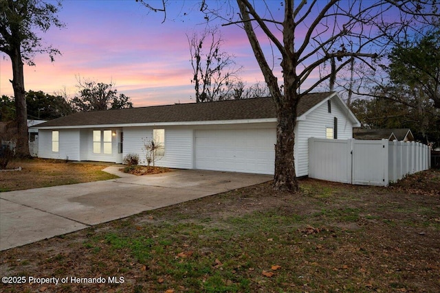 view of front of property featuring a garage