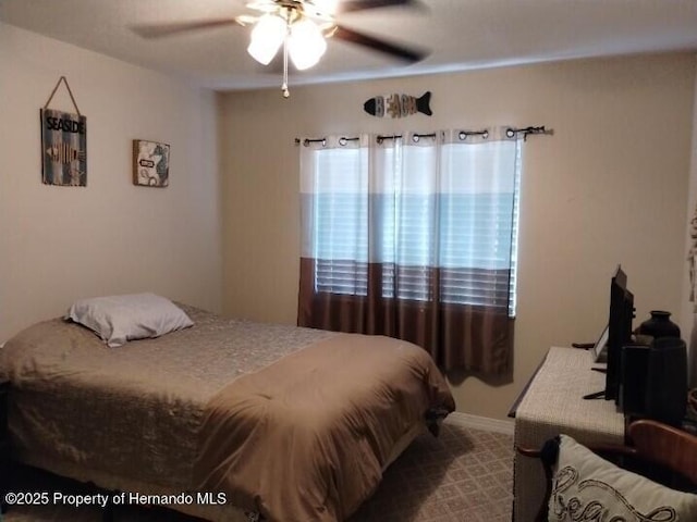 bedroom featuring ceiling fan