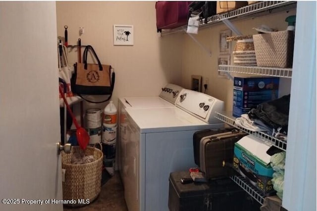 washroom featuring washing machine and dryer