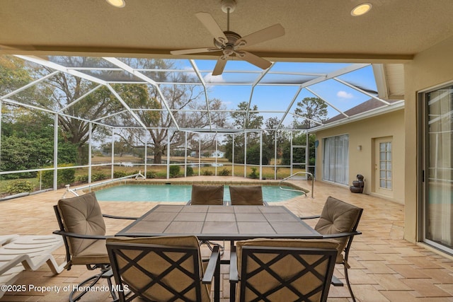 4412 Lake In The Woods Dr, Spring Hill, FL 34607 - outdoor pool with a patio, a lanai, and a ceiling fan