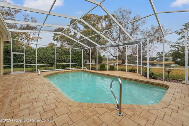 4412 Lake In The Woods Dr, Spring Hill, FL 34607 - pool with a water view, a patio area, and glass enclosure