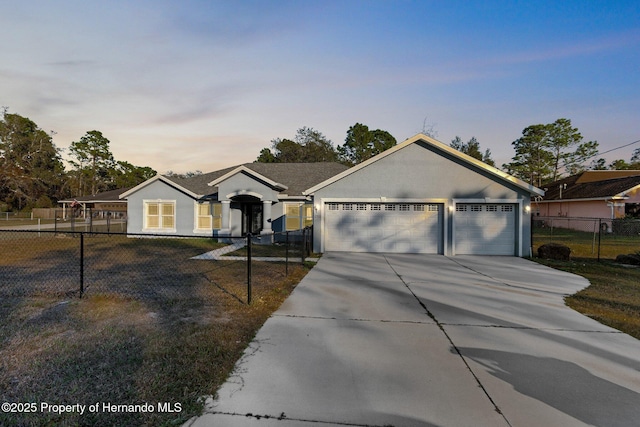 single story home featuring a garage