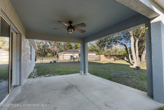 view of patio with ceiling fan