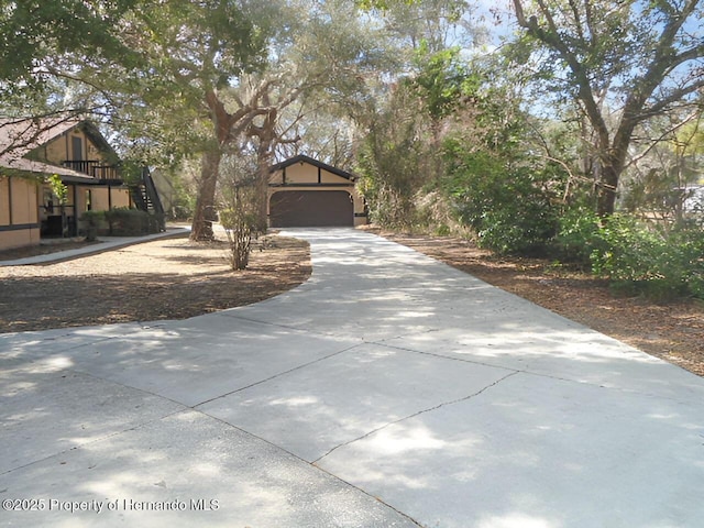 view of property exterior with a garage