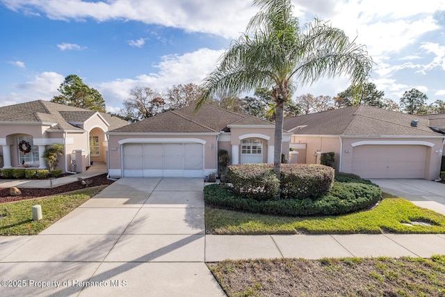 ranch-style home with a garage