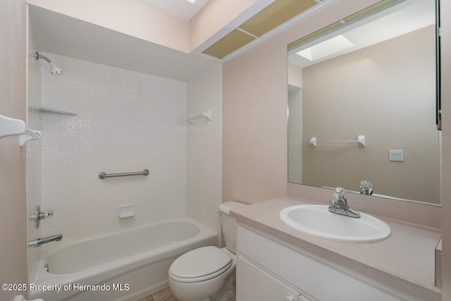 full bathroom with tiled shower / bath combo, vanity, and toilet