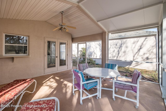 sunroom / solarium with french doors, ceiling fan, lofted ceiling, and wood ceiling