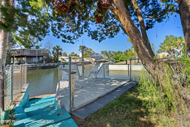 dock area featuring a water view