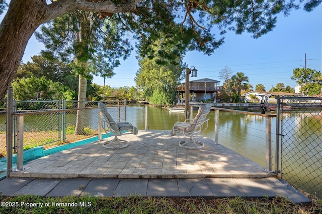 dock area with a water view