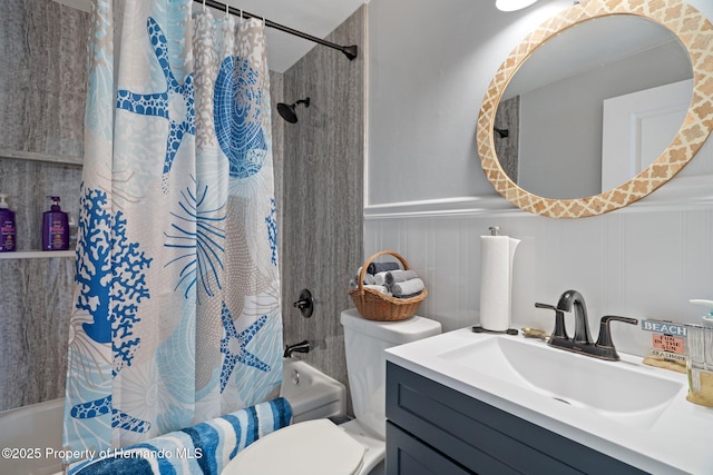 full bathroom featuring vanity, shower / bathtub combination with curtain, and toilet