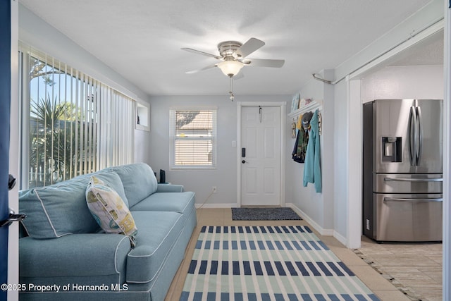 living room featuring ceiling fan