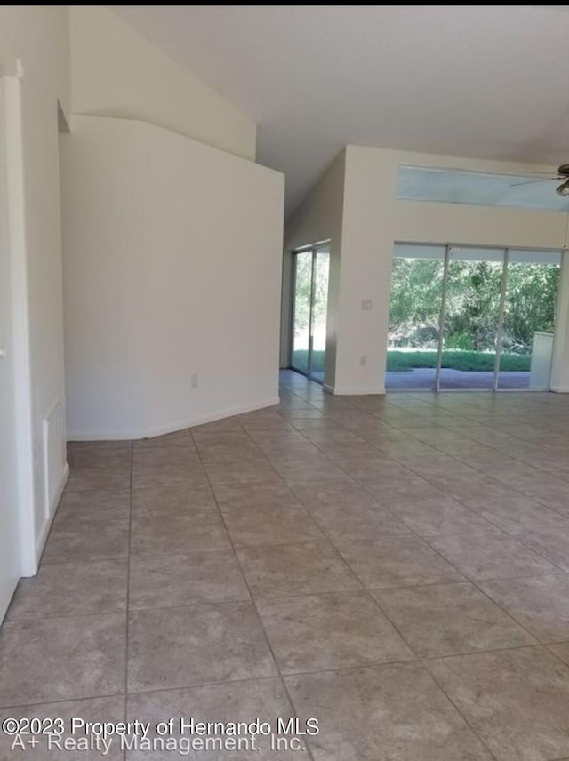 unfurnished room with ceiling fan