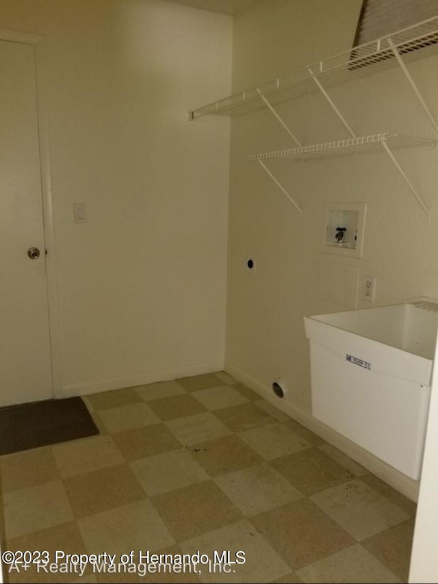 laundry area with electric dryer hookup and hookup for a washing machine