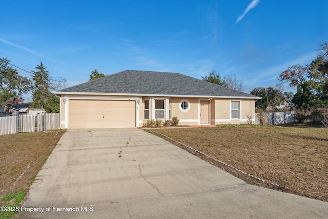 single story home with a garage and a front yard