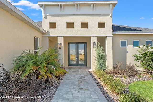 doorway to property with french doors